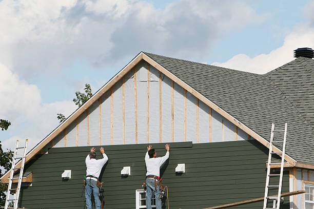 Professional Storm Damage Siding Repair technician working in Elkton, MD